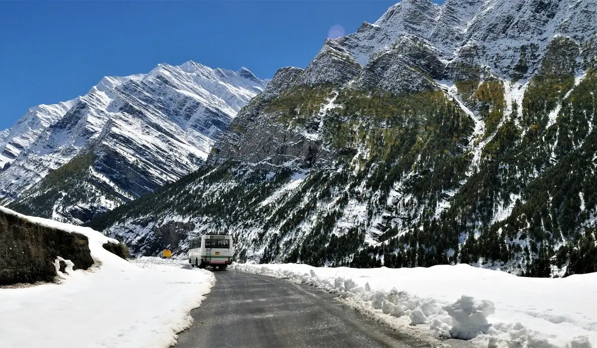 Overnight Volvo bus travelling through mountain highway to Himachal Pradesh