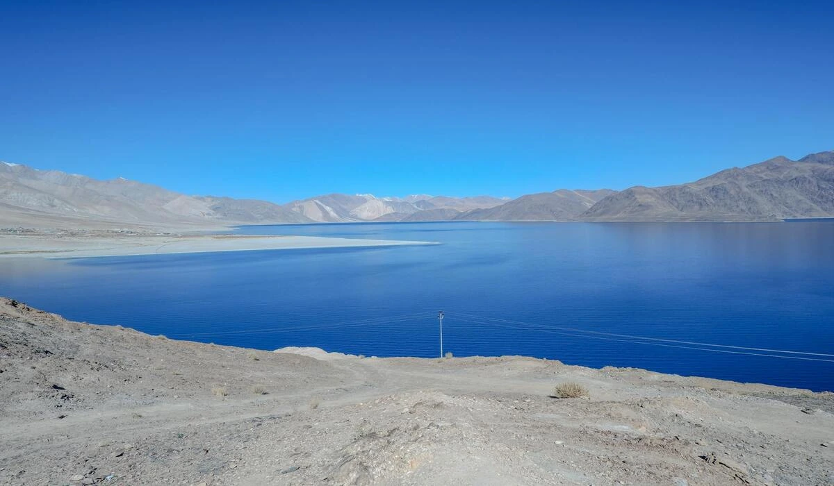 Pangong Tso Lake Ladakh with vivid blue water and Himalayan mountains