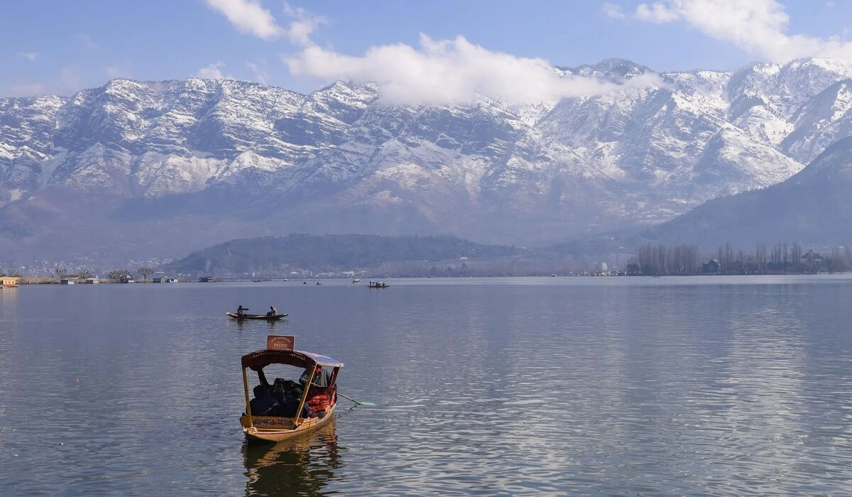 Dal Lake Srinagar with shikara boats Mughal Gardens and Himalayan peaks in background
